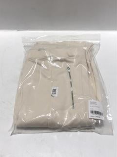 Lot 450  
            Chesterfield SR44 - Parcel Delivery Only 

                
RANDOM IDENTITIES ELASTIC PANTS IN BEIGE SIZE XS ORIGINAL RRP- £355 (LOCATION: L10)