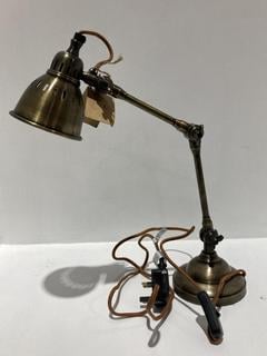 Lot 553  
            Chesterfield SR44 - Parcel Delivery Only 

                
NKUKU TUBU BRASS DESK LAMP IN ANTIQUE BRASS (LOCATION: L11)