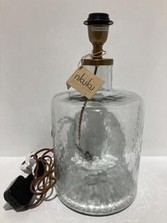 Lot 564  
            Chesterfield SR44 - Parcel Delivery Only 

                
NKUKU EDINA RECYCLED GLASS TABLE LAMP - CLEAR - SMALL - ITEM NO. EL0901 - ORIGINA...