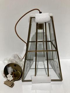 Lot 565  
            Chesterfield SR44 - Parcel Delivery Only 

                
NKUKU SOLAN GLASS LANTERN PENDANT - ANTIQUE BRASS & CLEAR - ITEM NO. SP5301 - ORI...