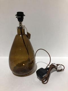 Lot 574  
            Chesterfield SR44 - Parcel Delivery Only 

                
NKUKU BABA RECYCLED GLASS LAMP - BURNT AMBER - SMALL TALL - ITEM NO. BL8101 - ORI...