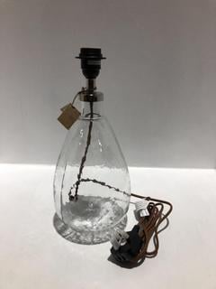 Lot 619  
            Chesterfield SR44 - Parcel Delivery Only 

                
NKUKU BABA RECYCLED GLASS LAMP - CLEAR - SMALL TALL - ITEM NO. BL5501 - ORIGINAL ...