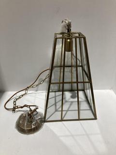 Lot 635  
            Chesterfield SR44 - Parcel Delivery Only 

                
NKUKU SOLAN GLASS LANTERN PENDANT - ANTIQUE BRASS & CLEAR - ITEM NO. SP5301 - ORI...