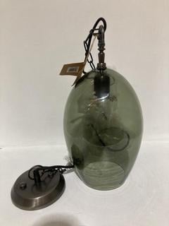 Lot 637  
            Chesterfield SR44 - Parcel Delivery Only 

                
NKUKU OTORO RECYCLED GLASS PENDANT - GREEN - SMALL OVAL - ITEM NO. OP2701 - ORIGI...