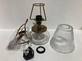 Lot 640  
            Chesterfield SR44 - Parcel Delivery Only 

                
NKUKU DIMALAI RECYCLED GLASS TABLE LAMP - CLEAR - ITEM NO. DI0101 - ORIGINAL RRP ...