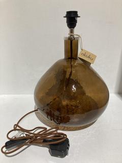 Lot 656  
            Chesterfield SR44 - Parcel Delivery Only 

                
NKUKU BABA RECYCLED GLASS LAMP - BURNT AMBER - LARGE WIDE - ITEM NO. BL8201 - ORI...