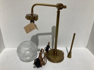 Lot 658  
            Chesterfield SR44 - Parcel Delivery Only 

                
NKUKU SENGOL RECYCLED GLASS DESK LAMP IN ANTIQUE BRASS (LOCATION: K3)