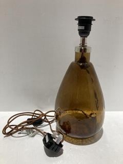 Lot 669  
            Chesterfield SR44 - Parcel Delivery Only 

                
NKUKU BABA RECYCLED GLASS LAMP - BURNT AMBER - SMALL TALL - ITEM NO. BL8101 - ORI...