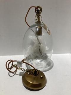 Lot 671  
            Chesterfield SR44 - Parcel Delivery Only 

                
NKUKU OTORO RECYCLED GLASS PENDANT - CLEAR - SMALL OVAL - ITEM NO. OP1401 - ORIGI...