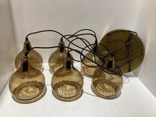 Lot 675  
            Chesterfield SR44 - Parcel Delivery Only 

                
NKUKU ZIVA STATEMENT RECYCLED GLASS CLUSTER PENDANT - LIGHT SMOKE BROWN - ITEM NO...
