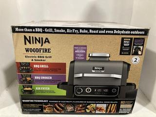 Lot 1149  
            Chesterfield SR47 - Parcel Delivery Only 

                
NINJA WOODFIRE ELECTRIC BBQ GRILL AND SMOKER ORIGINAL RRP £299 (LOCATION: I4)