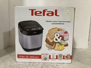 Lot 214  
            Chesterfield SR47 - Parcel Delivery Only 

                
TEFAL PAIN AND DELICES BREADMAKER ORIGINAL RRP £140 (LOCATION: F6)
