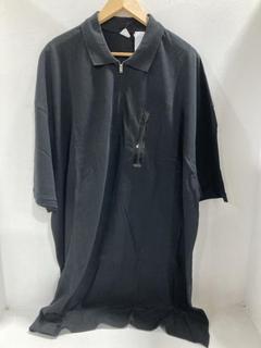 Lot 707  
            Chesterfield SR47 - Parcel Delivery Only 

                
RANDOM IDENTITIES OVERSIZED POLO IN BLACK SIZE M ORIGINAL RRP £205. (LOCATION: G11)