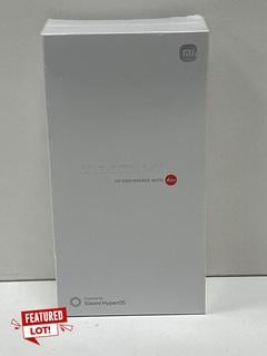 Lot 64  
            Nationwide - Parcel Delivery Only 

                
XIAOMI 14T 512 GB SMARTPHONE IN TITAN BLACK: MODEL NO 2406APNFAG (WITH BOX & ALL ...