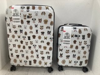Lot 1332  
            Marchington SR14 - Parcel Delivery Only 

                
IT LUGGAGE SET OF 2 METALIK DOG PRINT HARDSHELL 4-WHEEL SUITCASES IN WHITE: LOCAT...