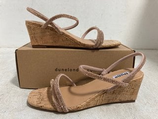 Lot 404  
            Marchington SR14 - Parcel Delivery Only 
                
DUNE LONDON KALIA BLUSH SYNTHETIC EMBELLISHED LOW CORK WEDGE SANDALS - UK SIZE 7 ...