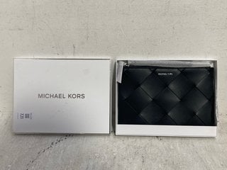 Lot 721  
            Marchington SR14 - Parcel Delivery Only 

                
MICHAEL KORS JET SET TRAVEL EXTRA LARGE WOVEN LEATHER WRISTLET - BLACK - ORIGINAL...