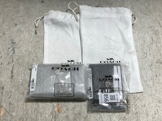 Lot 856  
            Marchington SR14 - Parcel Delivery Only 

                
COACH ESSENTIAL L-ZIP KEY CASE IN BLACK TO INCLUDE COACH ESSENTIAL CARD CASE IN B...