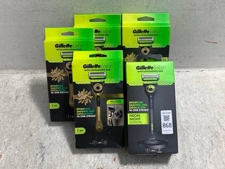 Lot 868  
            Marchington SR14 - Parcel Delivery Only 

                
4 X GILLETTE LABS GOLD RAZORS WITH EXFOLIATING BAR TO INCLUDE GILLETTE LABS NEON ...