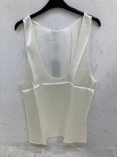 Lot 916  
            Marchington SR14 - Parcel Delivery Only 
                
PHIX SILK DEEP VEST IN IVORY - SIZE XS - ORIGINAL RRP £105: LOCATION - F2