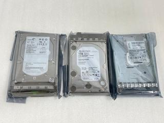 Lot 171  
            Marchington - Parcel Delivery Only 

                
3X MIXED HARD DRIVES. (TO INCLUDE WESTERN DIGITAL 1TB, SEAGATE CHEETAH 15K.7 300G...