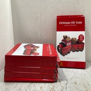 Lot 125  
            Marchington SR12 - Parcel Delivery Only 

                
6 X CHRISTMAS GIFT TRAIN, TRAIN & CARRIAGE: LOCATION - AR2