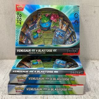 Lot 127  
            Marchington SR12 - Parcel Delivery Only 

                
3 X POKEMON TRADING CARD GAME VENUSAUR EX & BLASTOISE EX PREMIUM COLLECTION, COMB...