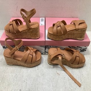 Lot 389  
            Marchington SR12 - Parcel Delivery Only 

                
2 X MODA IN PELLE WOVEN TWO PART WEDGE SANDAL IN TAN LEATHER - EU SIZE: 39 & 40: ...