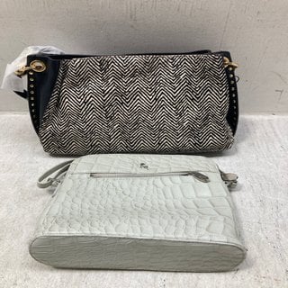 Lot 394  
            Marchington SR12 - Parcel Delivery Only 

                
ASHWOOD CROSS BODY HANDBAG IN GREY TO INCLUDE AIMEE KESTENBERG HANDBAG IN BLACK/W...