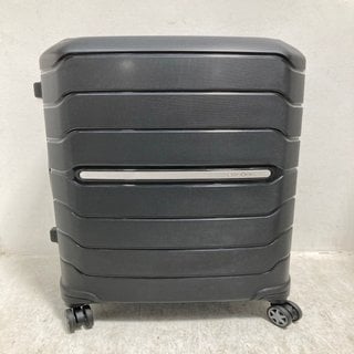 Lot 709  
            Marchington SR12 - Parcel Delivery Only 

                
SAMSONITE LARGE HARDSHELL SUITCASE IN BLACK: LOCATION - B0