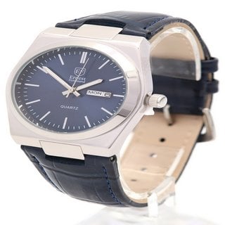 Lot 902  
            Marchington SR12 - Parcel Delivery Only 

                
ERNEST FERDINAND MEN'S WATCH. FEATURING A BLUE DIAL, SILVER COLOURED MARKERS AND ...