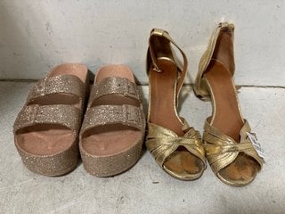 Lot 1210  
            Marchington SR10 - Parcel Delivery Only 

                
1 X PAIR OF LA REDOUTE SPARKLE HEELS SIZE 39 AND 1 X PAIR OF CACATOES PLATFORM SA...