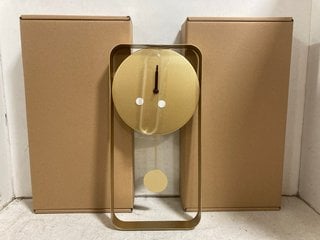 Lot 1216  
            Marchington SR10 - Parcel Delivery Only 

                
3 X MODERN PENDULUM STYLE WALL CLOCKS IN GOLD COLOUR FINISH - COMBINED ORIGINAL R...