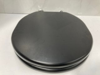 Lot 645  
            Marchington SR18 - Delivery or Collection 

                
SANEUX SOFIA OBSIDIAN BLACK SOFT CLOSED WOODEN W/C SEAT - ORIGINAL RRP £182: LOCA...