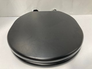 Lot 646  
            Marchington SR18 - Delivery or Collection 

                
SANEUX SOFIA OBSIDIAN BLACK SOFT CLOSED WOODEN W/C SEAT - ORIGINAL RRP £182: LOCA...