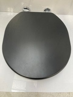 Lot 648  
            Marchington SR18 - Delivery or Collection 

                
SANEUX SOFIA OBSIDIAN BLACK SOFT CLOSED WOODEN W/C SEAT - ORIGINAL RRP £182: LOCA...