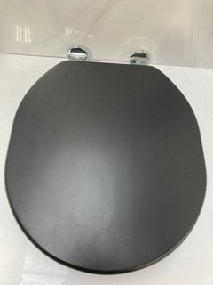 Lot 649  
            Marchington SR18 - Delivery or Collection 

                
SANEUX SOFIA OBSIDIAN BLACK SOFT CLOSED WOODEN W/C SEAT - ORIGINAL RRP £182: LOCA...