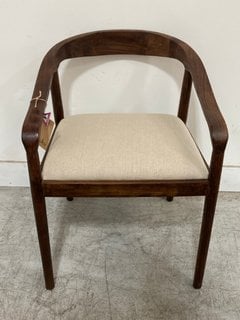 Lot 443  
            Marchington SR10 - Delivery or Collection 

                
NKUKU ANBU UPHOLSTERED DINING ARMCHAIR IN NATURAL FABRIC AND WASHED WALNUT FINISH...
