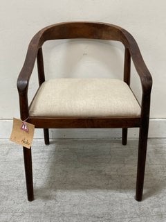 Lot 444  
            Marchington SR10 - Delivery or Collection 

                
NKUKU ANBU UPHOLSTERED DINING ARMCHAIR IN NATURAL FABRIC AND WASHED WALNUT FINISH...