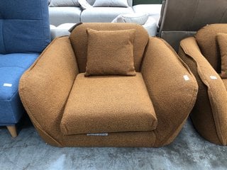Lot 45  
            Marchington SR10 - Delivery or Collection 

                
ERCOL HEXTON BOUCLE STYLE ARMCHAIR IN SPICE - ORIGINAL RRP £1999: LOCATION - B4