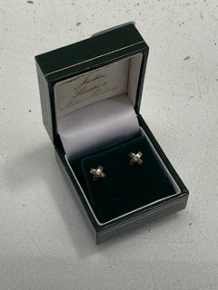 Lot 1037  
            Marchington SR13 - Parcel Delivery Only 

                
A PAIR OF HALLMARKED SILVER EARRINGS SET WITH CLEAR STONES, BOXED: LOCATION - F3