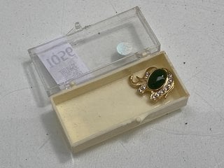 Lot 1056  
            Marchington SR13 - Parcel Delivery Only 

                
A VINTAGE GOLD COLOURED ELEPHANT BROOCH SET WITH CLEAR STONES AND A LARGE GREEN S...