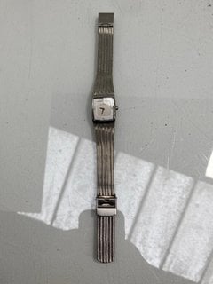 Lot 1057  
            Marchington SR13 - Parcel Delivery Only 

                
SKAGEN LADIES WRISTWATCH WITH A SILVER METAL MESH STRAP: LOCATION - F3