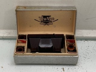 Lot 1121  
            Marchington SR13 - Parcel Delivery Only 

                
A VINTAGE TRU-VIEW THREE DIMENSIONAL IMAGE VIEWER, FIFTY-SIX SCENES OF THE GRAND ...