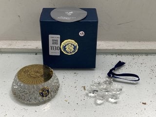 Lot 1130  
            Marchington SR13 - Parcel Delivery Only 

                
A SWAROVSKI CRYSTAL CHRISTMAS ORNAMENT AND A BOXED DERWENT ENGLISH LEAD CRYSTAL 4...