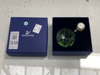 Lot 1138  
            Marchington SR13 - Parcel Delivery Only 

                
A BOXED SWAROVSKI CHRYSTAL HANGING PENDANT IN GREEN: LOCATION - F1