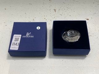 Lot 1143  
            Marchington SR13 - Parcel Delivery Only 

                
A BOXED SWAROVSKI CHRYSTAL SCULTPURE OF A SPIRAL SHELL: LOCATION - F1