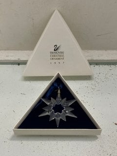 Lot 1146  
            Marchington SR13 - Parcel Delivery Only 

                
A BOXED SWAROVSKI CHRYSTAL CHRISTMAS ORNAMENT, 1997: LOCATION - F1