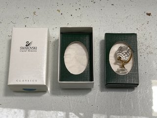 Lot 1148  
            Marchington SR13 - Parcel Delivery Only 

                
A BOXED SWAROVSKI CHRYSTAL SCULTPURE OF A GLOBE: LOCATION - F1