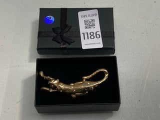Lot 1186  
            Marchington SR13 - Parcel Delivery Only 

                
A GOLD COLOURED CAT BROOCH SET WITH CLEAR STONES, BOXED: LOCATION - F1